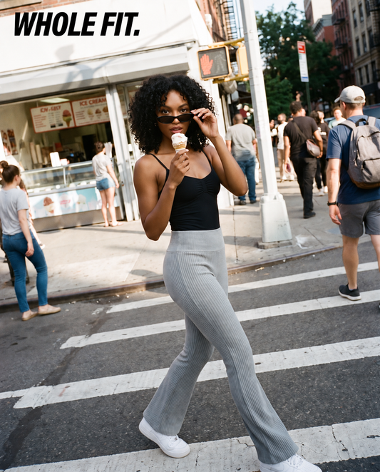 The Everyday Fit — Black + Heather Grey, natural open-eyed expression